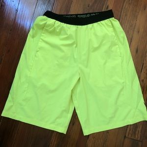 Nike bright yellow men’s athletic shorts